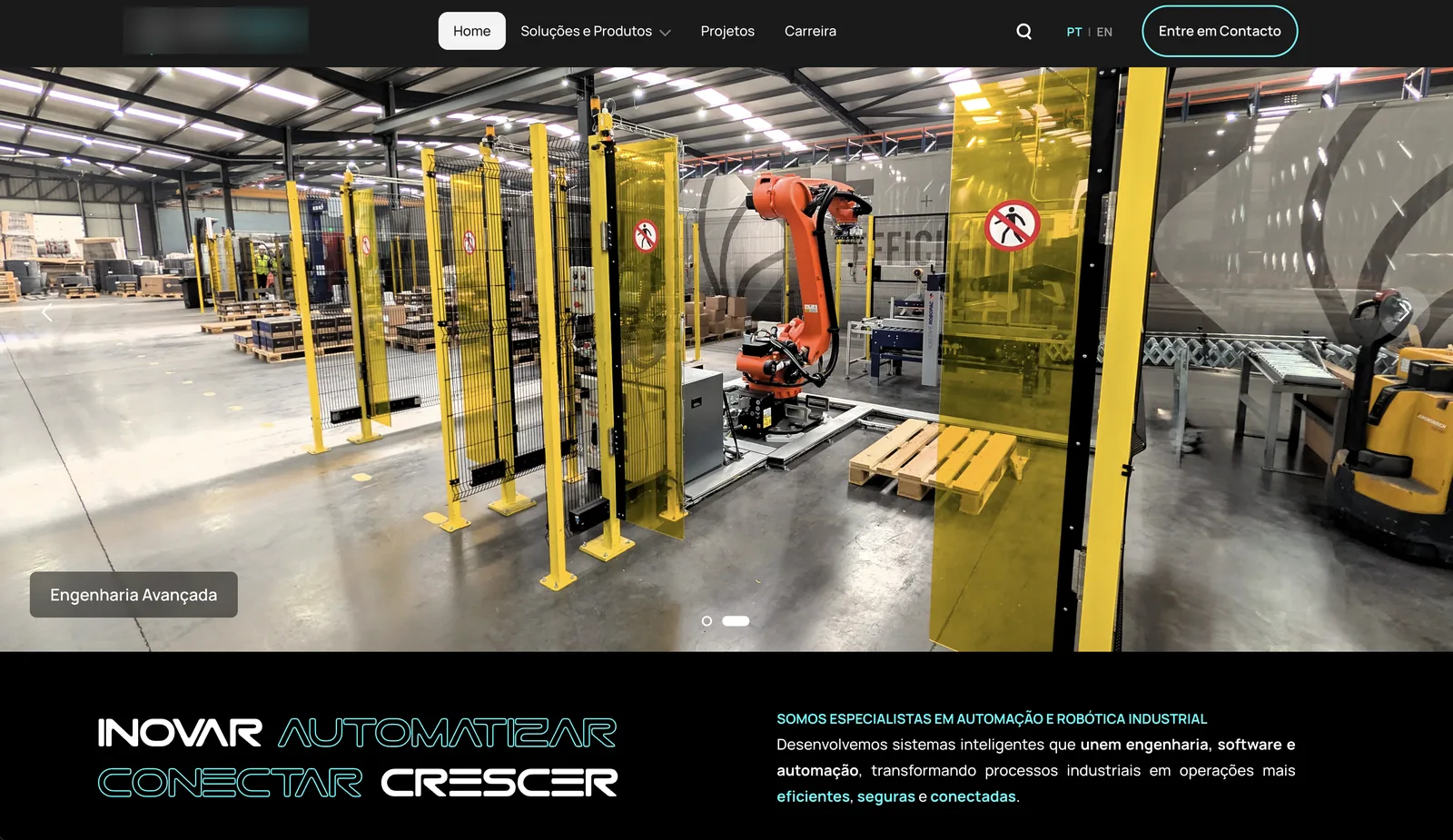 The current homepage of an industrial robotics company, name and logo blurred